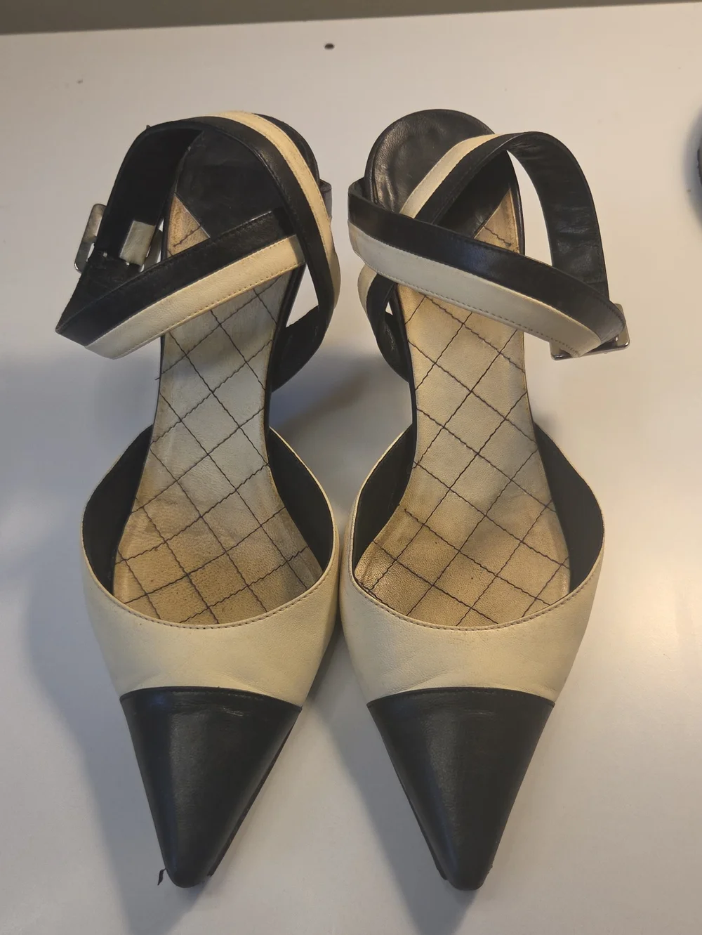 Chanel sling-back pumps feature a sophisticated pointed toe READ 35